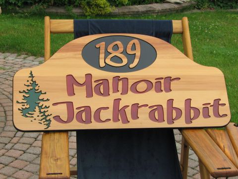 Wooden sign for Ski Trail Mont Tremblant